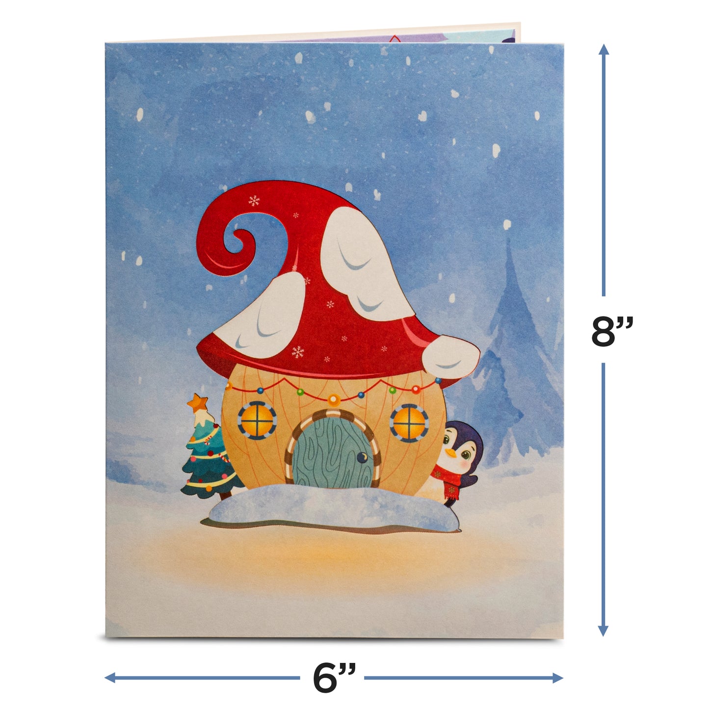 Closed Christmas card with a whimsical mushroom house design, measuring 6x8 inches.