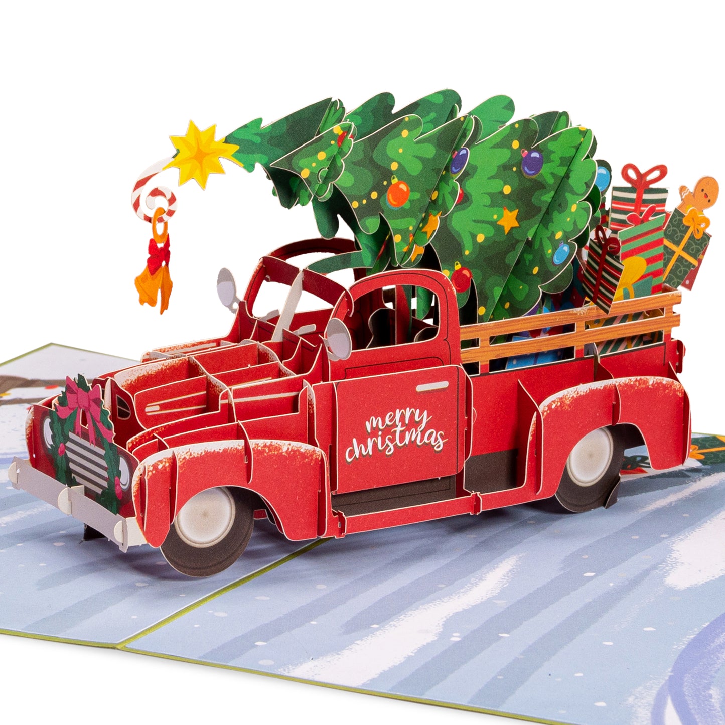 Christmas pop-up card showcasing a red truck with a tree and holiday gifts.