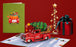 Christmas card set with a pop-up red truck, green cover, and holiday decorations.