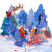 Close-up of the Magical Town Christmas pop-up card with snowy trees and a red bridge.
