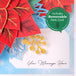 Close-up of poinsettia pop-up card with removable note card for personalized messages.