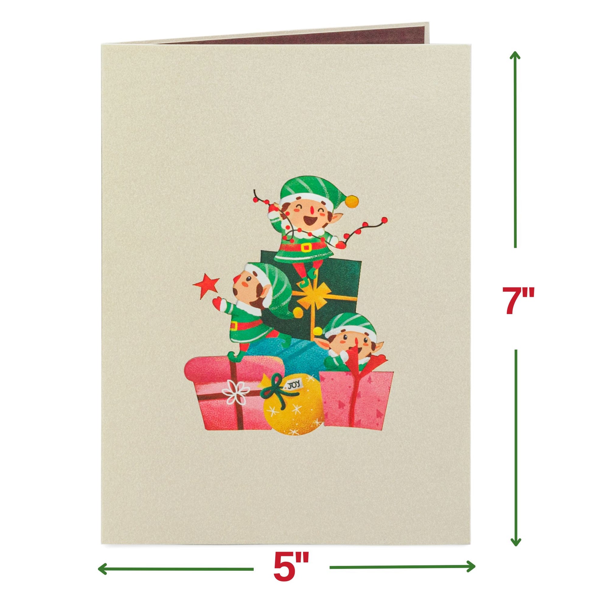 Front cover of Christmas pop-up card featuring cheerful elves and gifts.