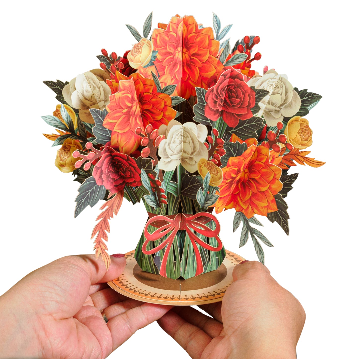 Hands holding a Boho pop-up flower bouquet card with intricate floral details.