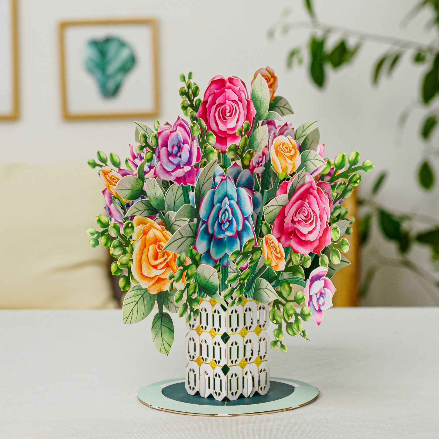 Roses and succulent pop-up card displayed as a decorative centerpiece on a table.