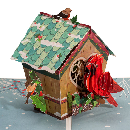 Love Bird House pop-up Christmas card featuring a 3D birdhouse with cardinals and holly.