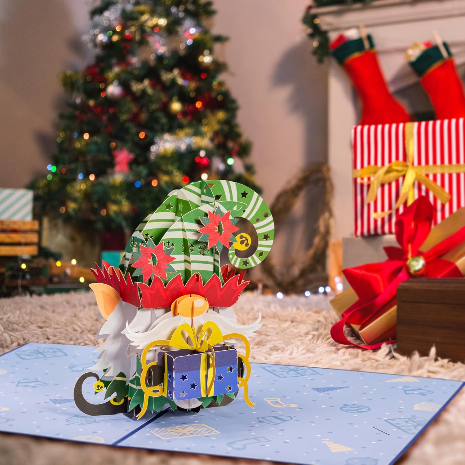 Elf Gnome pop-up card displayed in a cozy Christmas setting with decorations.