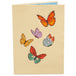 Greeting card cover with illustrated butterflies in vivid colors.