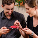 Close-up of two people admiring the 3D red truck in the Classic Truck Pop Up Card.