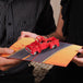 Two people holding the open Classic Truck Pop Up Card featuring a 3D red vintage truck.