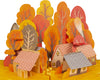 fall foliage pop up greeting card, fall trees in the background with wooden cabinets